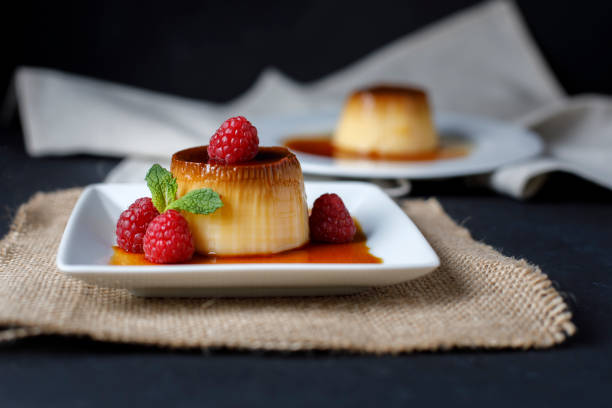 istock Egg flan with raspberries and mint leaves 1155635563