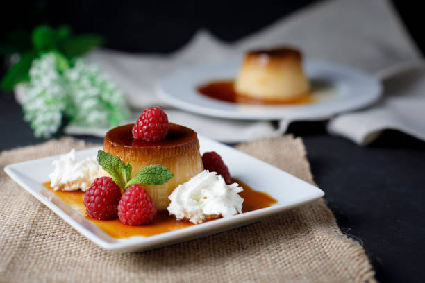istock Egg flan with raspberries and mint leaves 1155635564