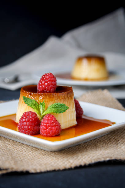 istock Egg flan with raspberries and mint leaves 1155635580