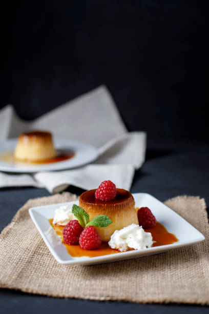 istock Egg flan with raspberries and mint leaves 1155635583