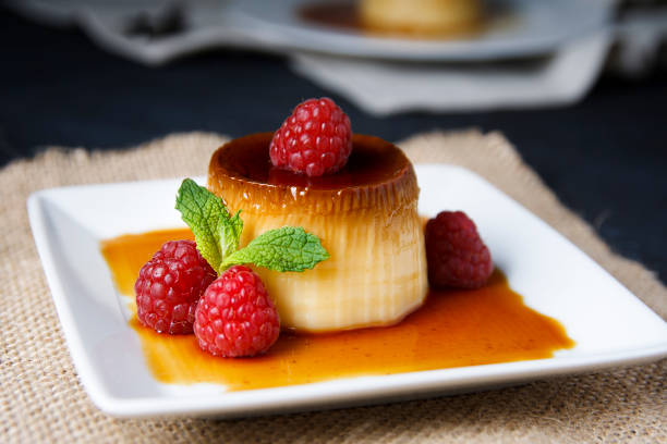 istock Egg flan with raspberries and mint leaves 1155635584