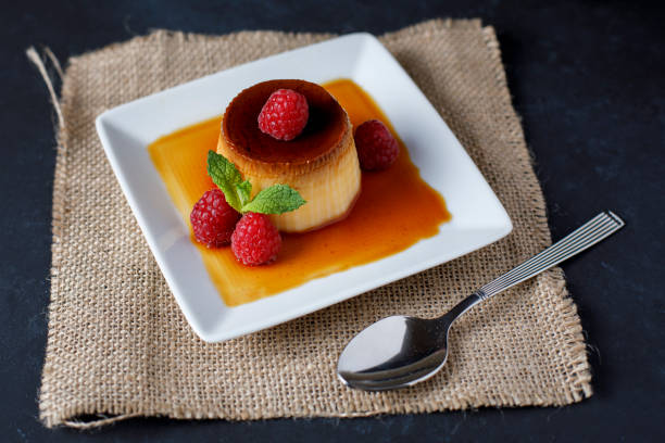 istock Egg flan with raspberries and mint leaves 1155635586