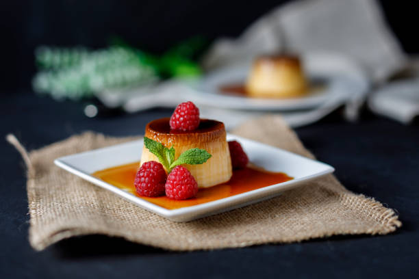 istock Egg flan with raspberries and mint leaves 1155635594