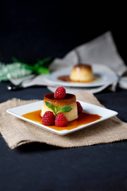 istock Egg flan with raspberries and mint leaves 1155635608