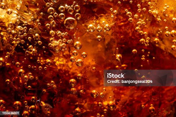 Detail Of Cold Bubbly Carbonated Soft Drink With Ice Stock Photo - Download Image Now