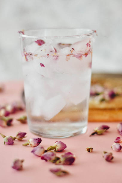 istock Rose water drink cool on pink and marble background 1155636089