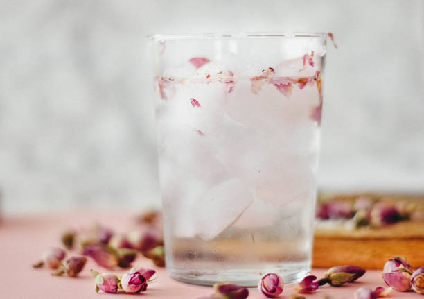 istock Rose water drink cool on pink and marble background 1155636099
