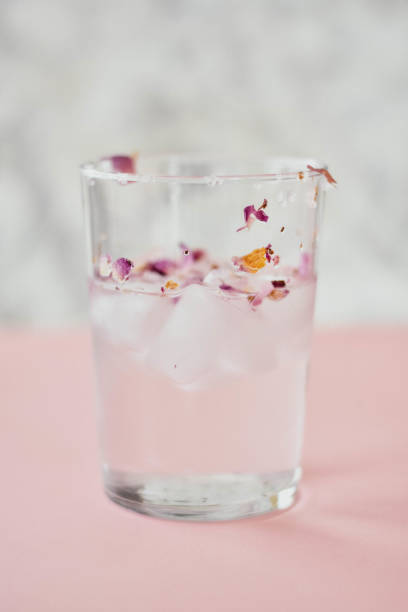 istock Rose water drink cool on pink and marble background 1155636113