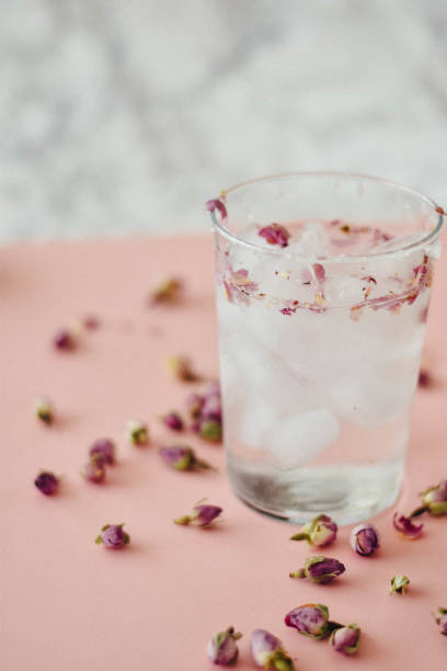 istock Rose water drink cool on pink and marble background 1155636137
