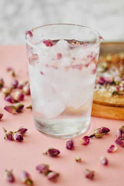 istock Rose water drink cool on pink and marble background 1155636149
