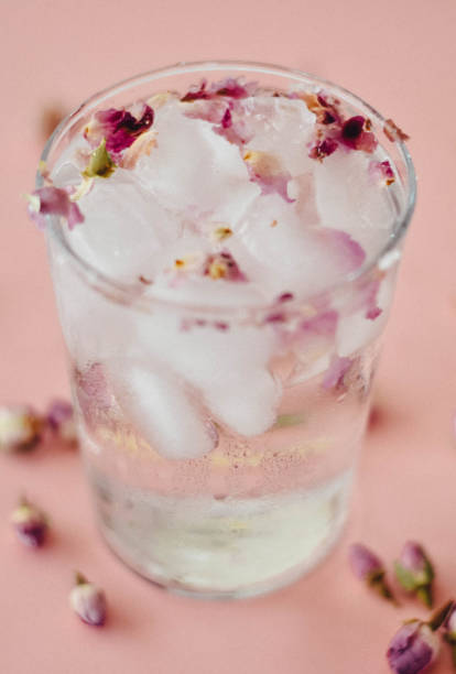 istock Rose water drink cool on pink and marble background 1155636271