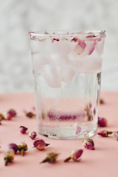 istock Rose water drink cool on pink and marble background 1155636315