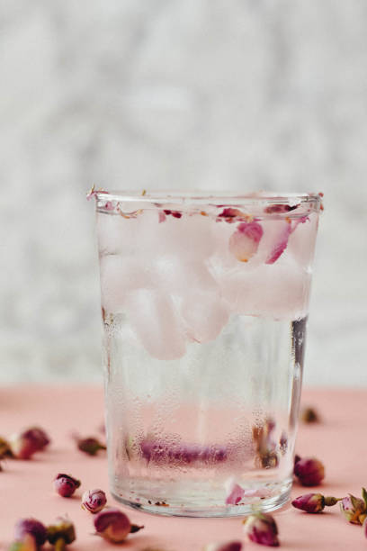istock Rose water drink cool on pink and marble background 1155636327