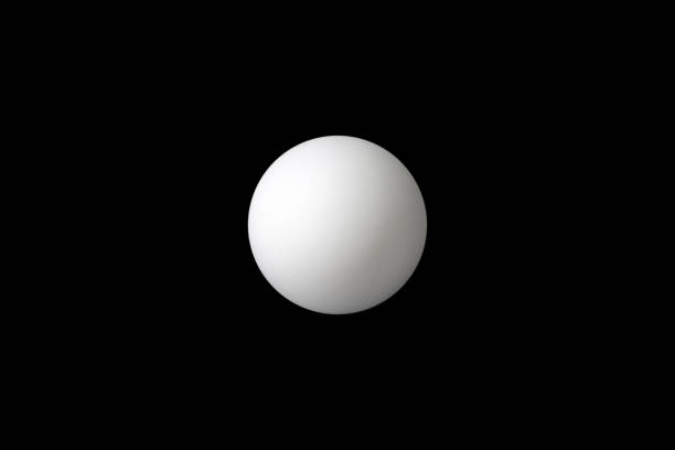 istock Tennis ball on a black background. 1155643908