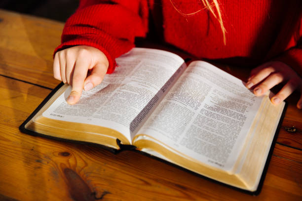 istock Studying the words of the God 1155644963