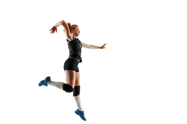 istock Young female volleyball player isolated on white studio background 1155645406