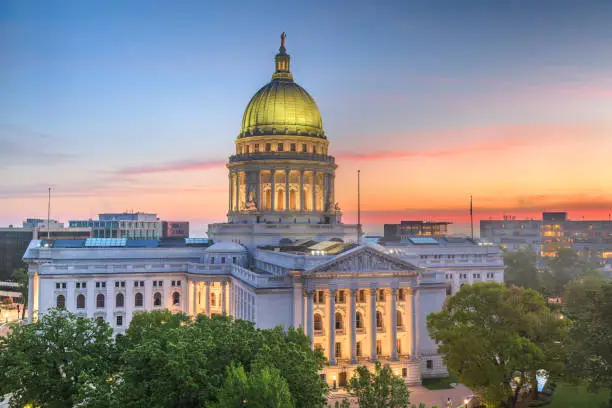 Madison, Wisconsin, USA state capitol building at dusk.