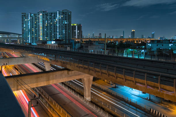 istock Sky train railway in metropolis in night life. Transportation concept. 1155652760