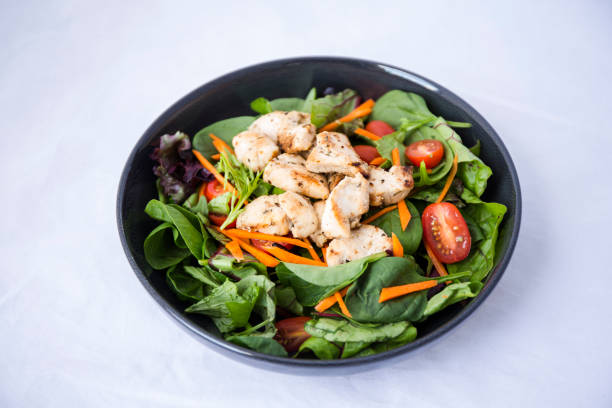 istock Green salad with chicken 1155655259