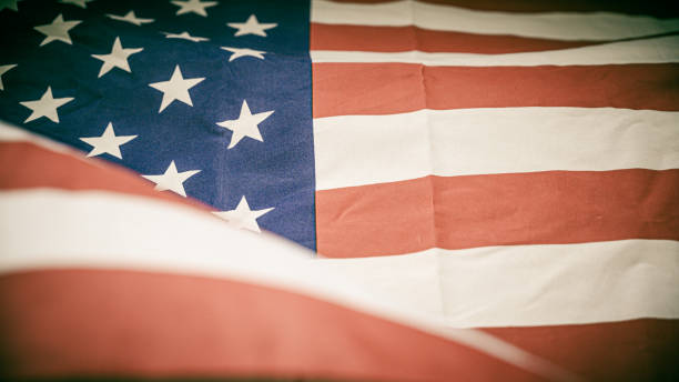 istock America flag waving with the wind for memorial day. 1155660464