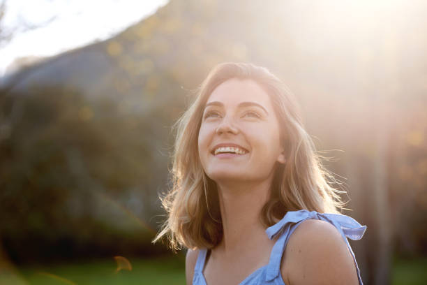 istock carefree woman in spring 1155664237