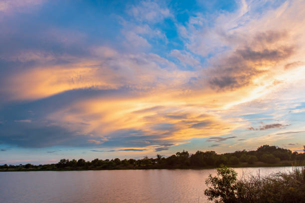 Sky and cloud at sunset with sunset light effects background. clouds twilight and dramatic sky background