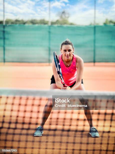 Woman Playing Tennis Stock Photo - Download Image Now - 30-39 Years, Sport, Tennis