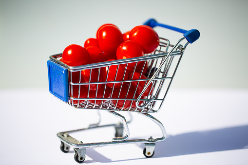 Cocktail tomatoes in the shopping cart