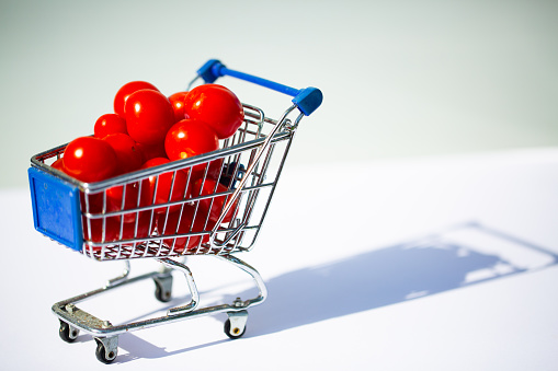 Cocktail tomatoes in the shopping cart