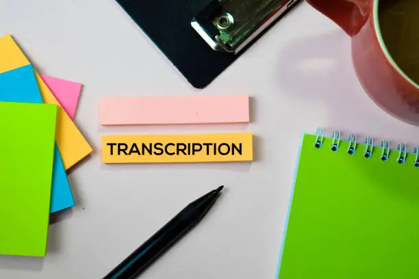 Transcription text on sticky notes with office desk concept