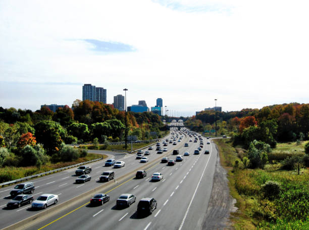 day traffic on the 6 lane Don Valley Parkway Highway in Toronto stock photo