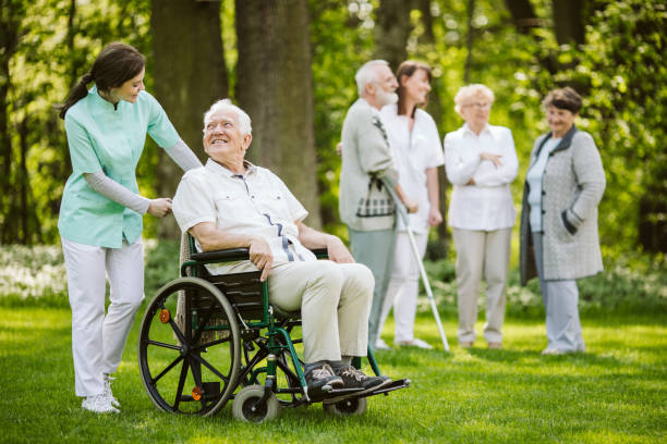 istock Group of patients and nurses in the nursing home 1155671369