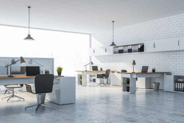 istock White brick office with white shelves 1155672850