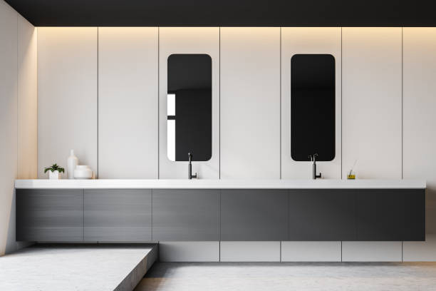 istock Gray double bathroom sink with mirrors 1155673878