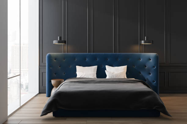 istock Gray master bedroom with blue bed 1155674157