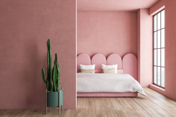 istock Minimalistic pink bedroom interior with cactus 1155674294
