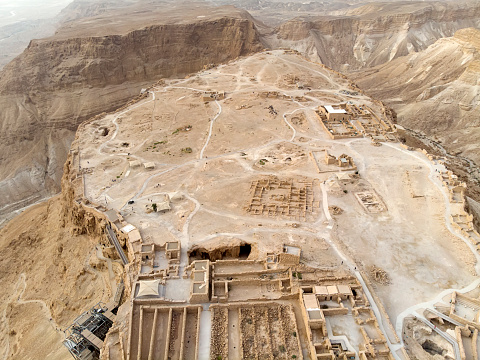 Masada fortress area Southern District of Israel Dead Sea area Southern District of Israel. Ancient Jewish fortress of the Roman Empire on top of a rock in the Judean desert. front view from the air