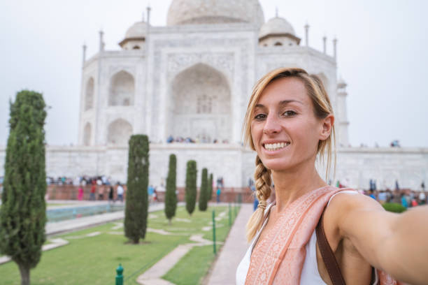 Tourist Taking Selfie At The Famous Taj Mahal At Sunset Using Mobile Phone  Agra India People Travel Asia Concept Stock Photo - Download Image Now -  iStock