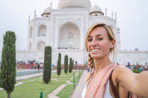 Tourist Taking Selfie At The Famous Taj Mahal At Sunset Using Mobile Phone Agra India People Travel Asia Concept Stock Photo - Download Image Now - iStock Tourist Taking Selfie At The Famous Taj Mahal At Sunset Using Mobile Phone Agra India People Travel Asia Concept Stock Photo - Download Image Now - iStock