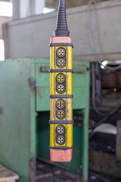 istock Movement remote control pendant switch for overhead crane in the factory 1155678257