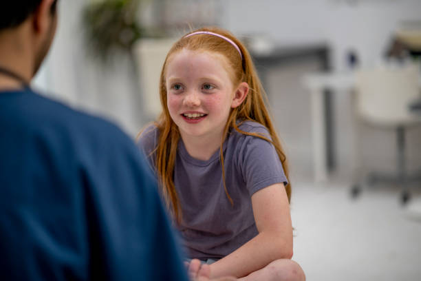 istock Girl at doctor's office 1155678465