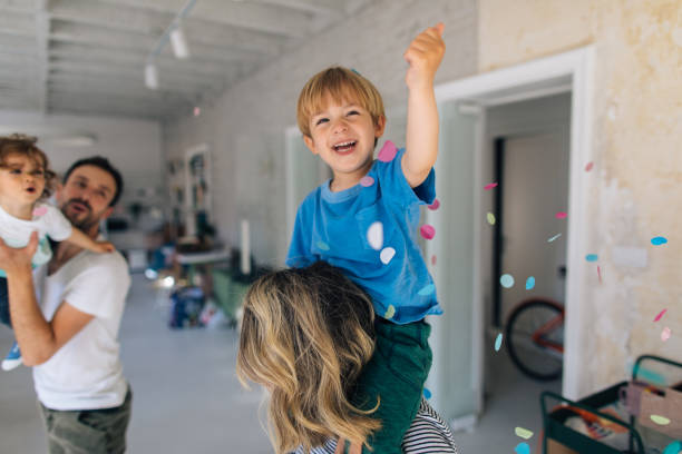 istock Happy family having fun at home 1155686868