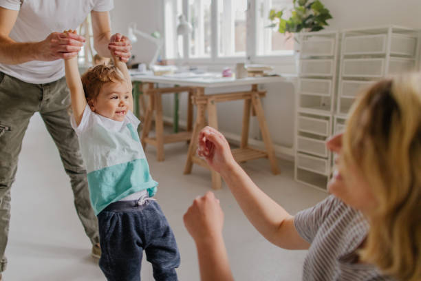 istock Happy family having fun at home 1155686961
