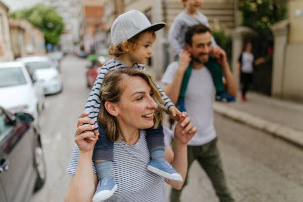 istock Happy family in a walk 1155687127