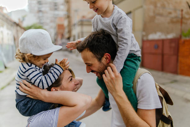 istock Happy family in a walk 1155687198