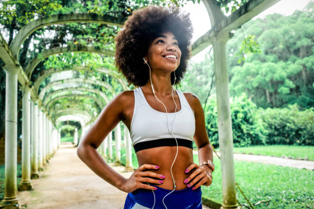 istock fit young woman taking a break from training 1155688030
