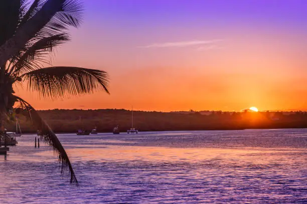 Porto Seguro, Arraial d’Ajuda sunset - tropical beach with palm trees in Bahia, northeast Brazil