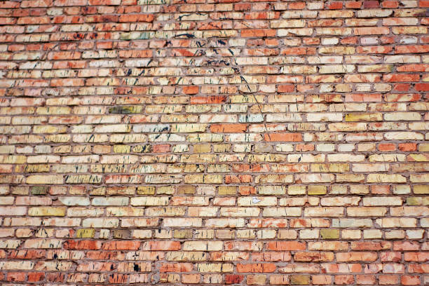 istock Texture of urban old bricks walls, stone structure closeup background 1155694088