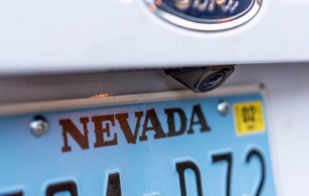 Las Vegas, USA - Close up on the word 'Nevada' on a license plate from the state, on a Ford car.