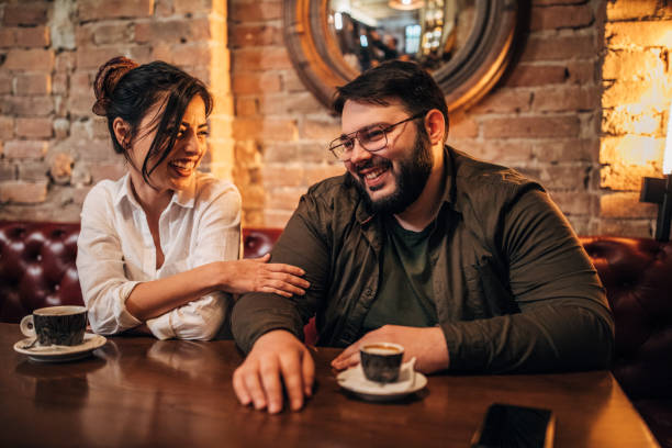 istock Cheerful friends at cafe 1155699902